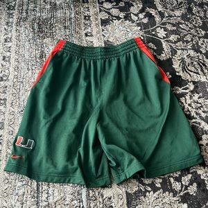 Nike sz Md University of Miami green and orange basketball shorts with pockets